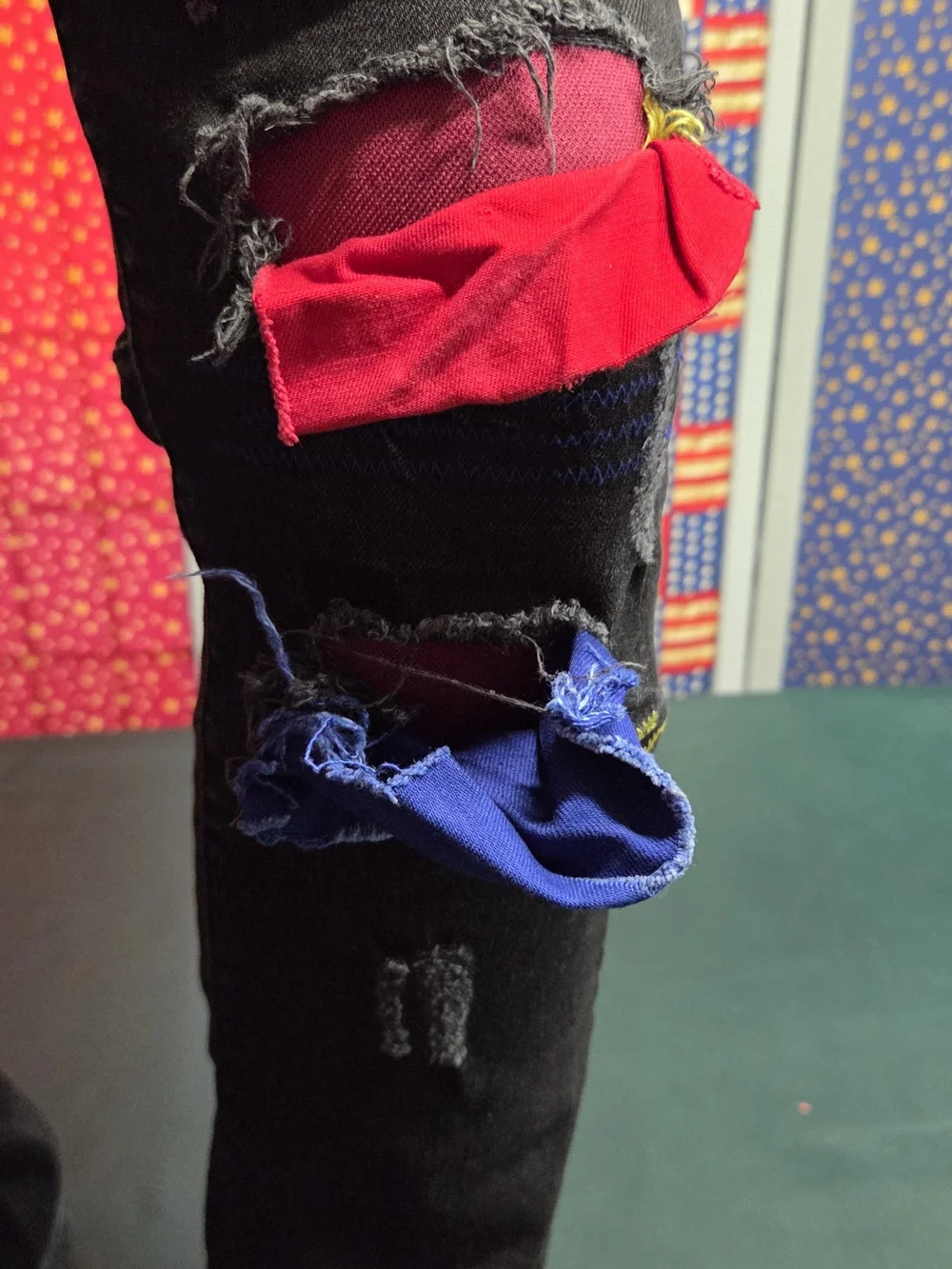 **Black Distressed Men’s Jeans with Color Patch Accents** - Picture 3 of 14